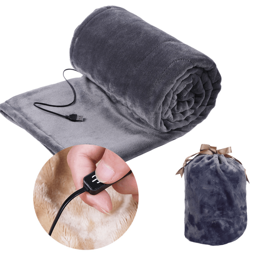 USB Heated electric blanket rolled up with USB power connector for warmth and comfort anywhere.